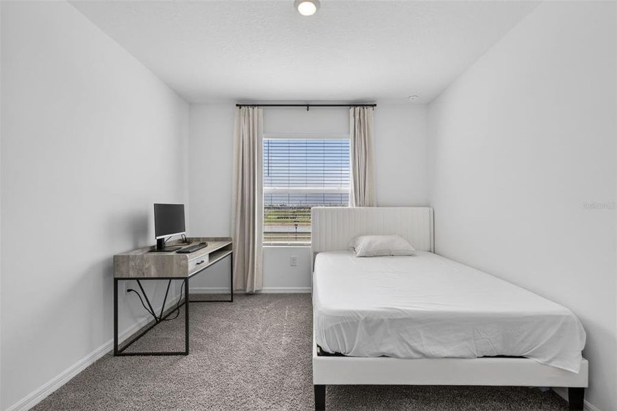 Furnished interior view inside a new home in Mangrove Point, Apollo Beach (Image 31).