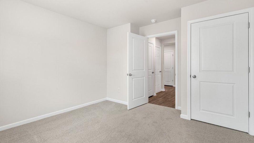 Representative unfurnished interior of a home built from the CALI by D.R. Horton in Wilson's Ridge, Wilson's Mills (Image 21).