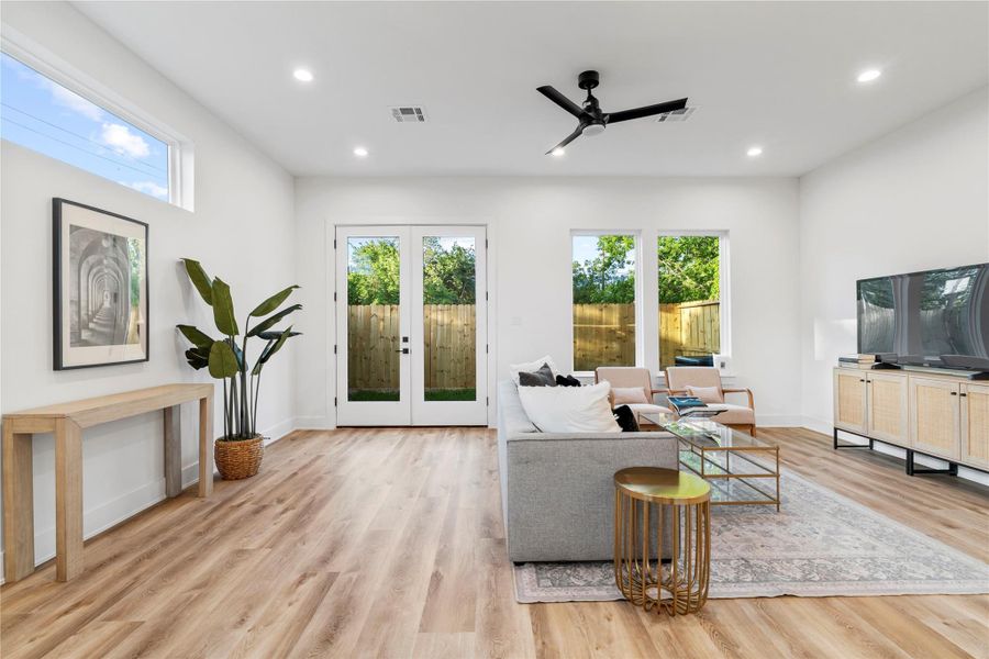 Spacious open living extends effortlessly to the backyard, ideal for entertaining or relaxing under the sun Spacious open living extends effortlessly to the backyard, ideal for entertaining or relaxing under the sun