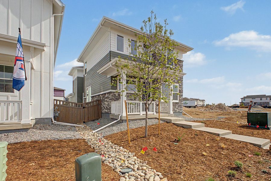 Exterior details and patio area of a home in Painted Prairie, Aurora (Image 4).
