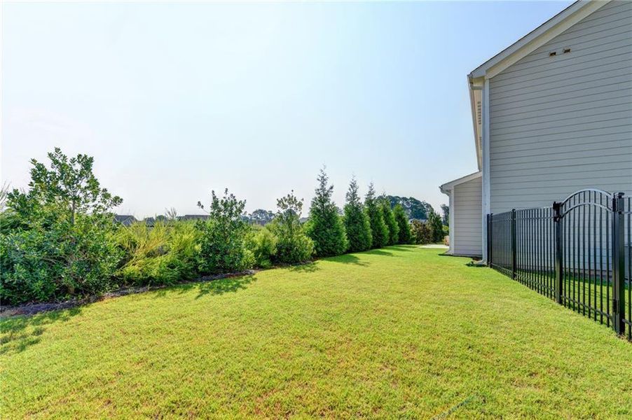 Exterior details and patio area of a home in Sweetbay Farm, Lawrenceville (Image 26).