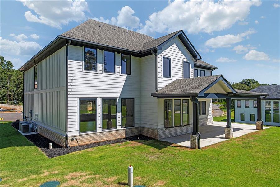 Front exterior of a new home in , Auburn, GA, highlighting curb appeal (Image 23).
