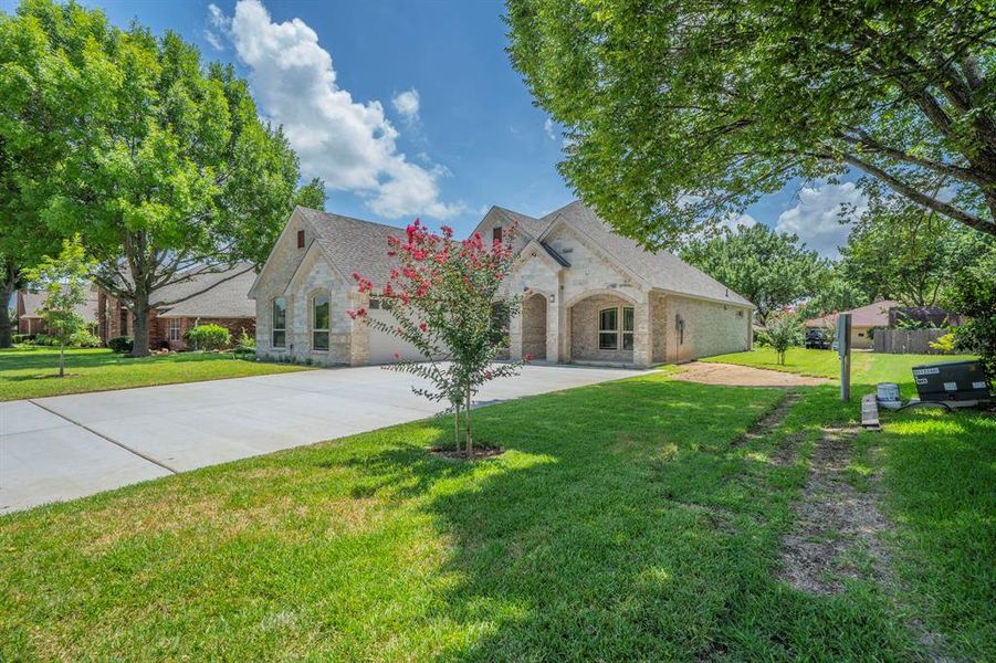 Front exterior of a new home in , Duncanville, TX, highlighting curb appeal (Image 19). Front exterior of a new home in , Duncanville, TX, highlighting curb appeal (Image 19).