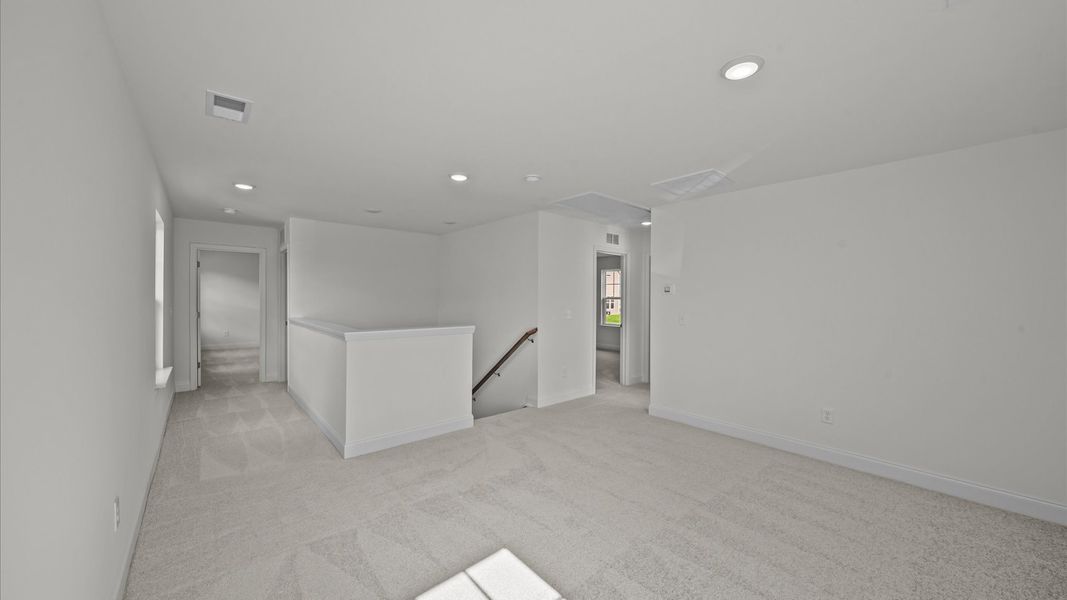 Representative furnished interior of a home built from the Jasmine by DRB Homes in Essex Village, Franklinton (Image 17).