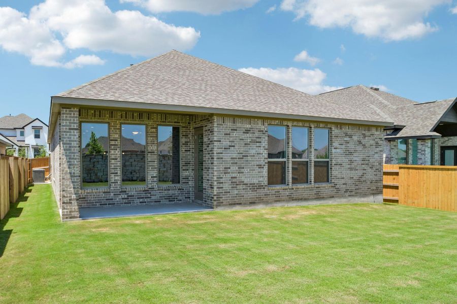 Exterior details and patio area of a home in 6 Creeks, Kyle (Image 20).