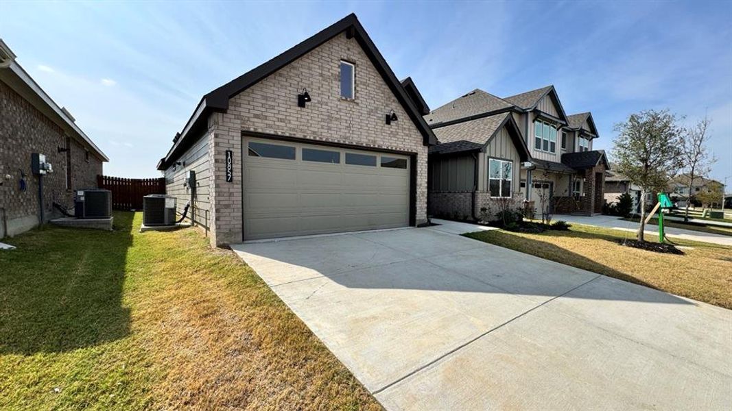 Front exterior of a new home in Rock Creek Ranch, Fort Worth, TX, highlighting curb appeal (Image 2).