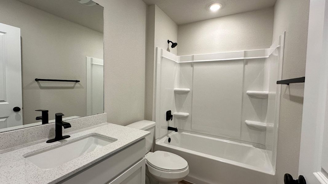 Furnished interior view inside a new home in The Lakes Northwest, Robstown (Image 13).