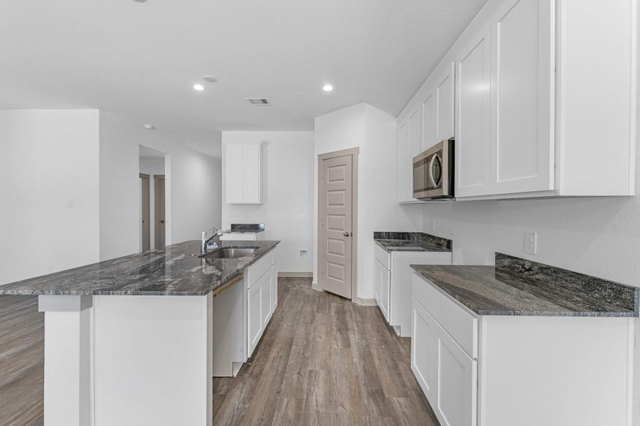 Furnished interior view inside a new home in Watermark, Alvin (Image 7).