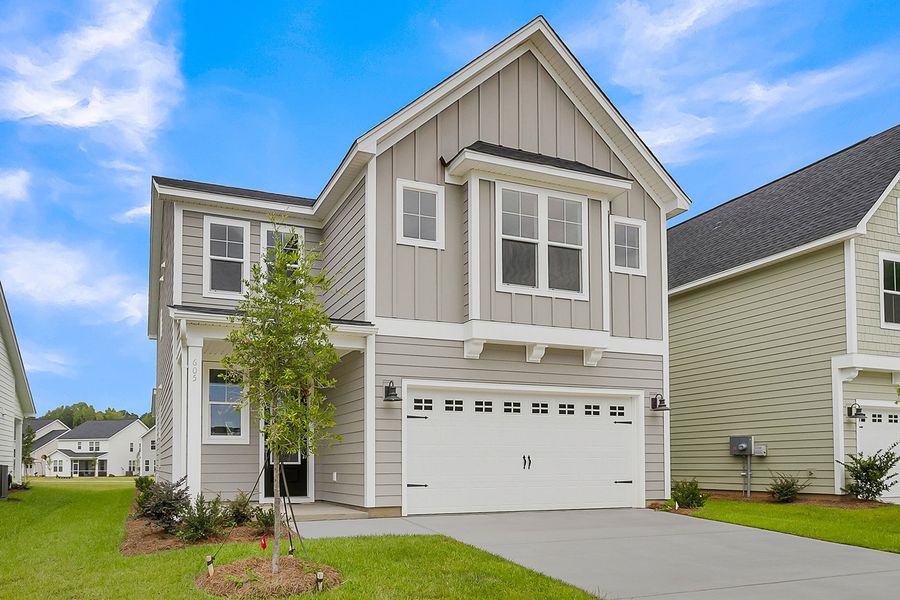 Front exterior of a new home in Pineland Preserve, Summerville, SC, highlighting curb appeal (Image 30).