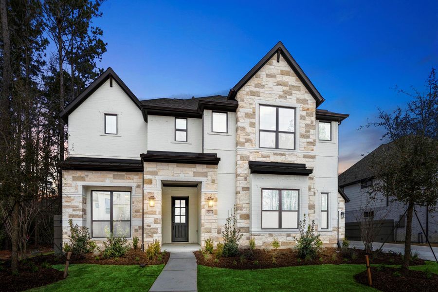 Front exterior of a new home in Artavia 70′ Lots, Conroe, TX, highlighting curb appeal (Image 25).