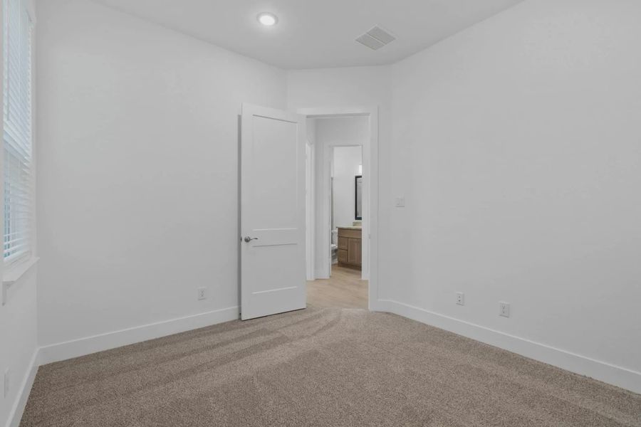 Representative unfurnished interior of a home built from the Rivercrest by Chesmar Homes in Fulshear Lakes, Fulshear (Image 87).