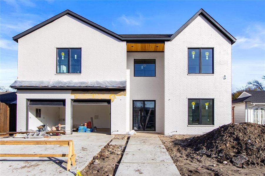 Front exterior of a new home in , Dallas, TX, highlighting curb appeal (Image 1). Front exterior of a new home in , Dallas, TX, highlighting curb appeal (Image 1).
