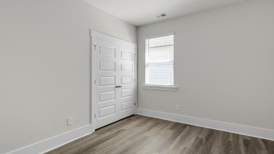 Spacious, unfurnished interior of a new home in The Haven at Indigo Preserve, Leland (Image 22).