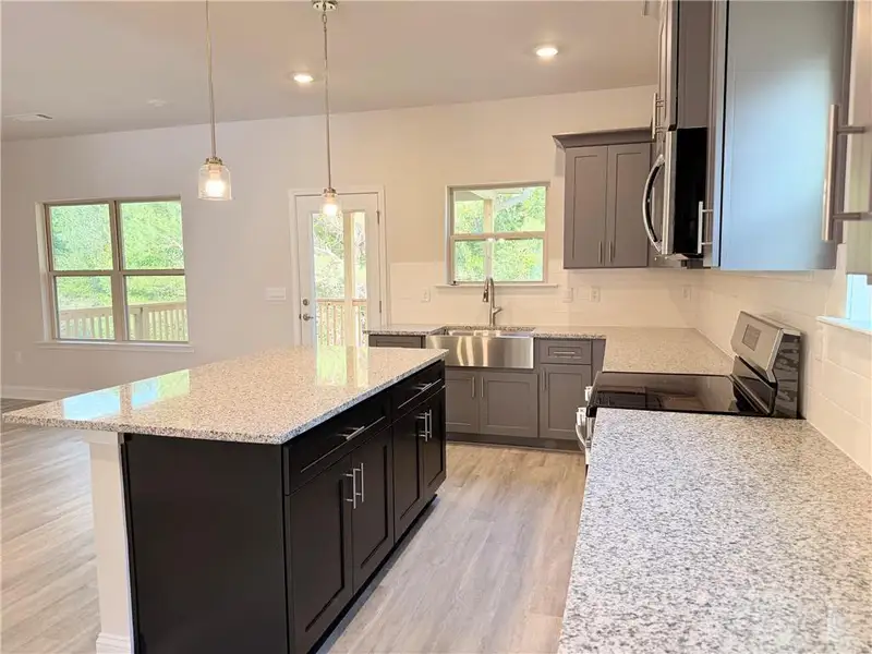 Furnished interior view inside a new home in Magnolia Villas, Cornelia (Image 9).