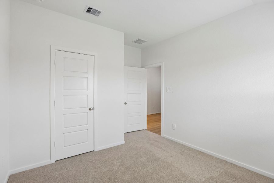 Spacious, unfurnished interior of a new home in Riviera Pines - Classic Series, Huffman (Image 30).