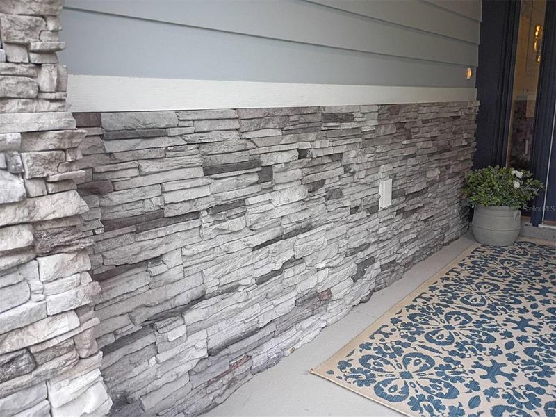 Exterior details and patio area of a home in , Lake City (Image 29).