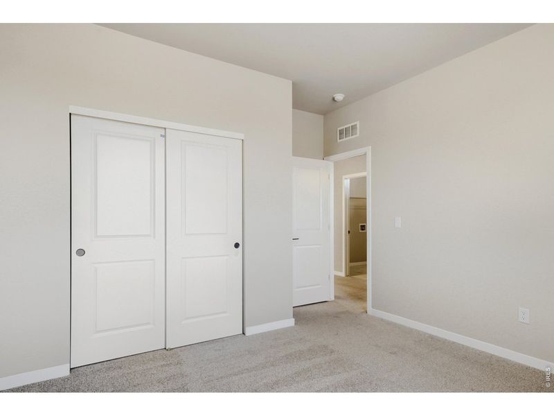 Spacious, unfurnished interior of a new home in Farmstead, Berthoud (Image 30).