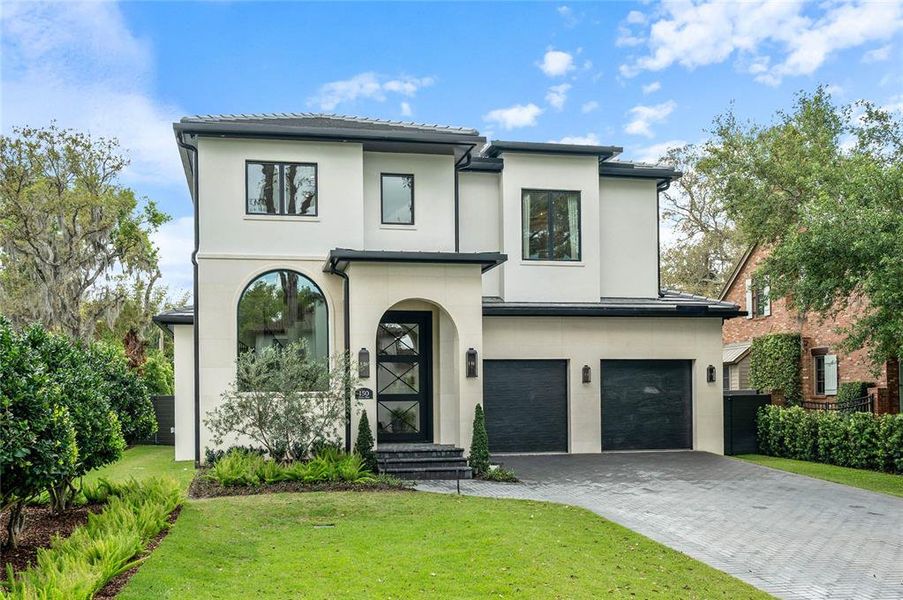 Front exterior of a new home in , Winter Park, FL, highlighting curb appeal (Image 24).