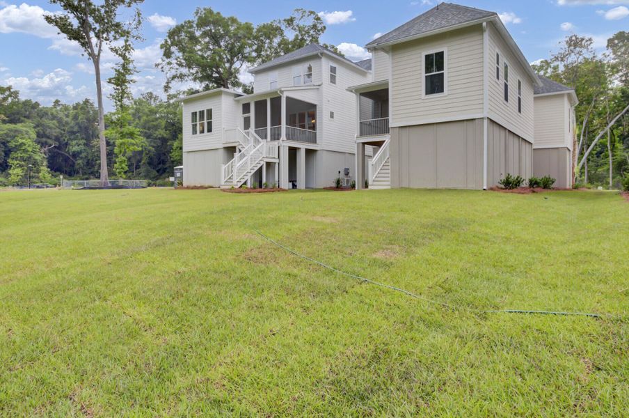 Exterior details and patio area of a home in , Johns Island (Image 26).