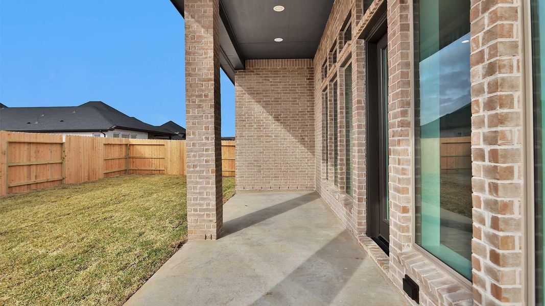 Exterior details and patio area of a home in The Grand Prairie, Hockley (Image 3).