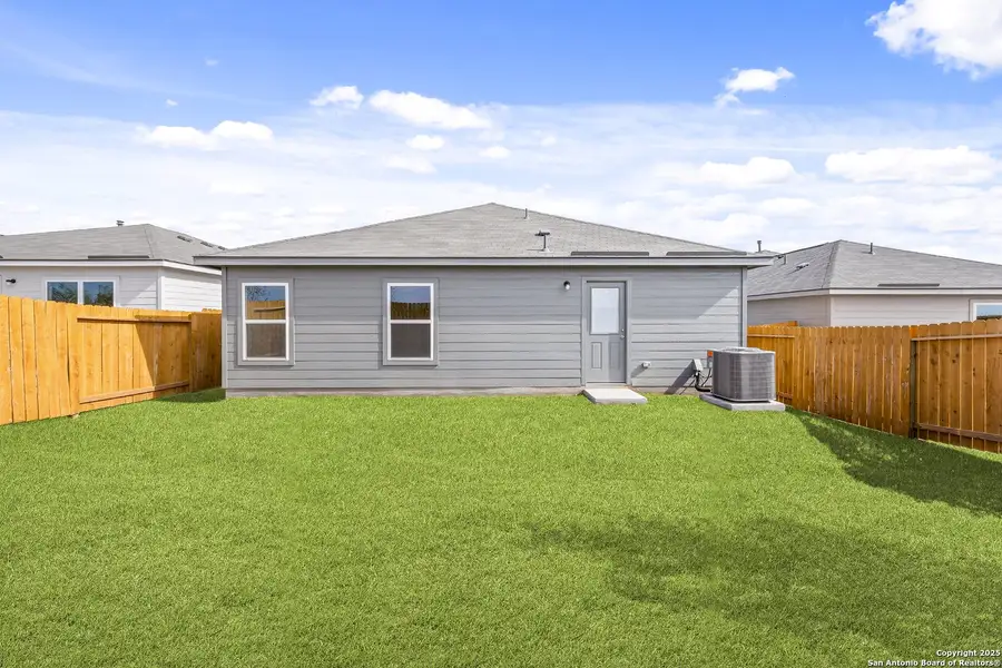 Front exterior of a new home in Preserve at Medina, Von Ormy, TX, highlighting curb appeal (Image 2).