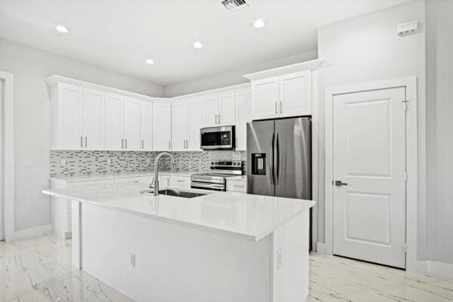 Furnished interior view inside a new home in , Fort Pierce (Image 7). Furnished interior view inside a new home in , Fort Pierce (Image 7).