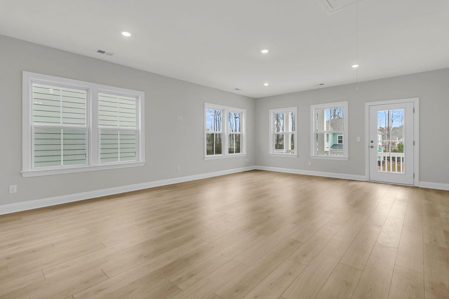 Spacious, unfurnished interior of a new home in Tidewater at Lakes of Cane Bay, Summerville (Image 37).
