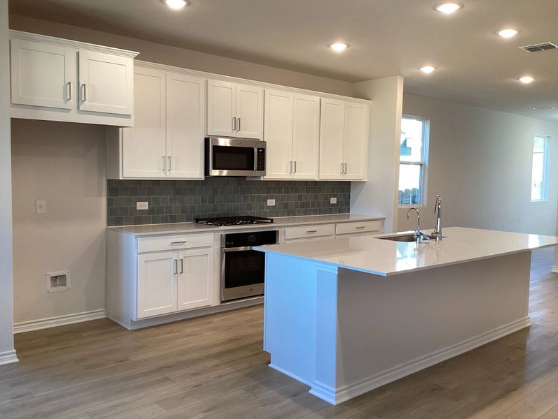 Furnished interior view inside a new home in The Homestead at Lariat, Liberty Hill (Image 7).