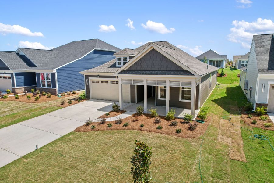 Front exterior of a new home in Carolina Riverside, Belmont, NC, highlighting curb appeal (Image 24).