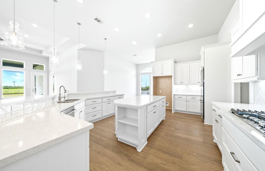 Furnished interior view inside a new home in Bridgeland 60′, Cypress (Image 7).
