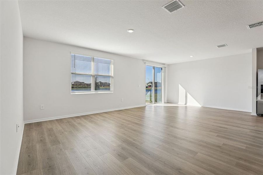 Spacious, unfurnished interior of a new home in Lake Deer Estates - Signature Series, Poinciana (Image 18).