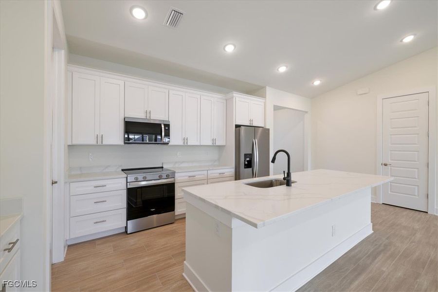 Furnished interior view inside a new home in Cape Coral, Cape Coral (Image 9). Furnished interior view inside a new home in Cape Coral, Cape Coral (Image 9).