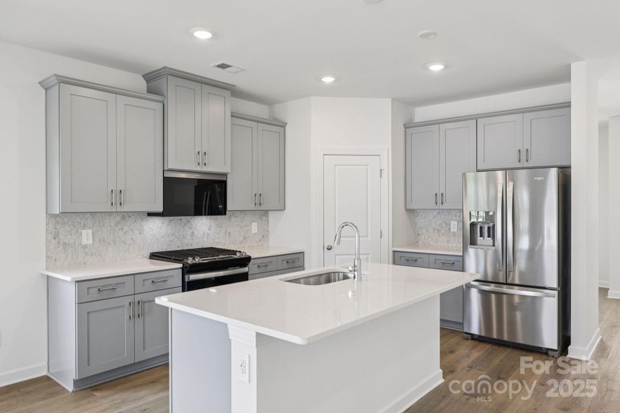 Photo is not of the actual home, but is an inspirational photo of builder’s model home and may depict options, furnishings, and/or decorator features that are not included