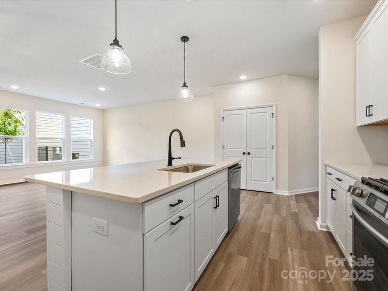 Furnished interior view inside a new home in North Creek Village - Townhomes, Huntersville (Image 11).