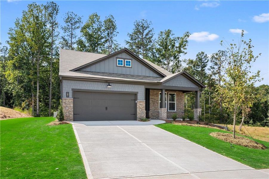 Front exterior of a new home in Cambridge at Steels Bridge: Steels Bridge, Canton, GA, highlighting curb appeal (Image 21). Front exterior of a new home in Cambridge at Steels Bridge: Steels Bridge, Canton, GA, highlighting curb appeal (Image 21).
