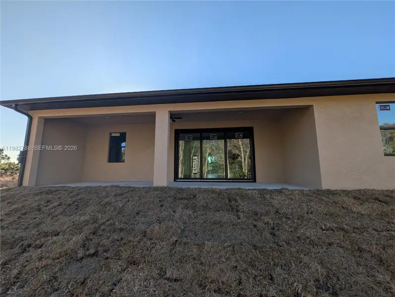 Exterior details and patio area of a home in , Lehigh Acres (Image 10).
