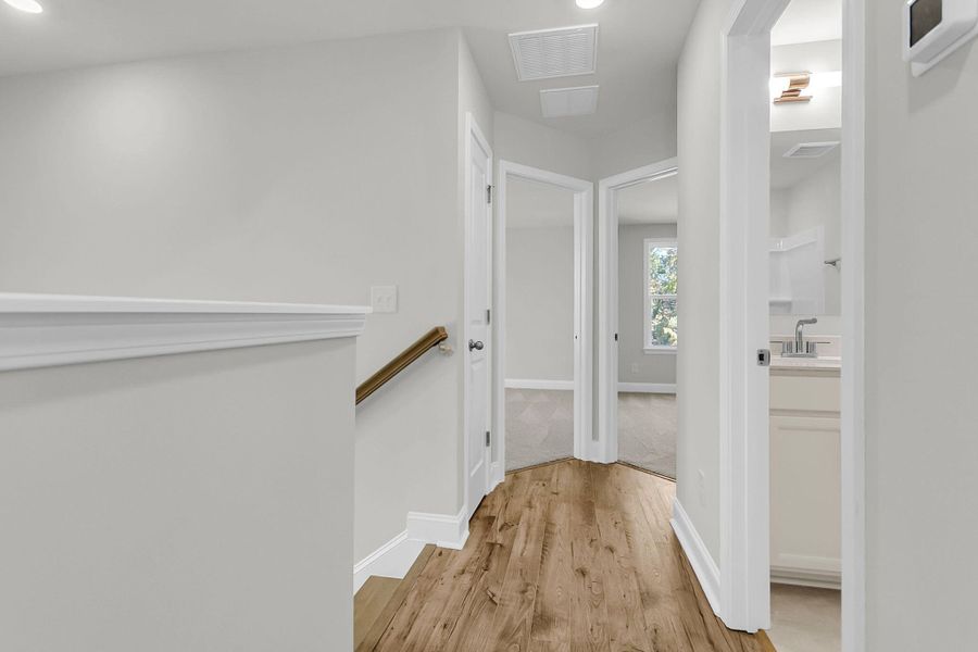 Spacious, unfurnished interior of a new home in Sweetgrass Station, Summerville (Image 24).