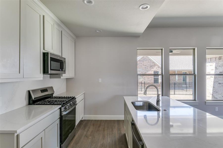 The kitchen has GE Profile appliances. The kitchen has GE Profile appliances.