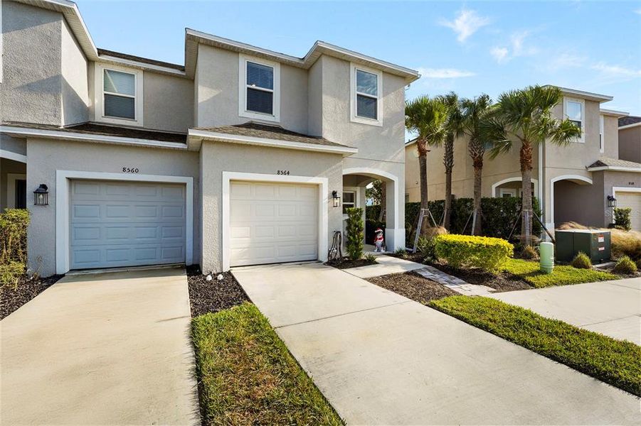 Front exterior of a new home in , Sarasota, FL, highlighting curb appeal (Image 1). Front exterior of a new home in , Sarasota, FL, highlighting curb appeal (Image 1).