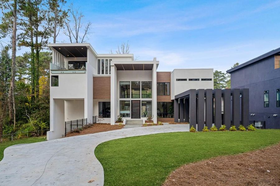 Front exterior of a new home in , Decatur, GA, highlighting curb appeal (Image 1).