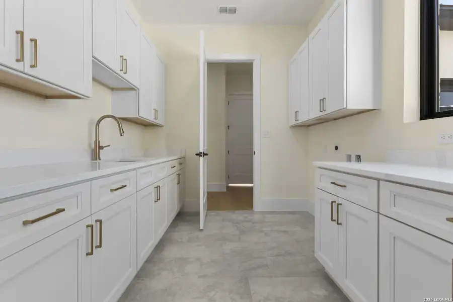 Furnished interior view inside a new home in , San Antonio (Image 17).
