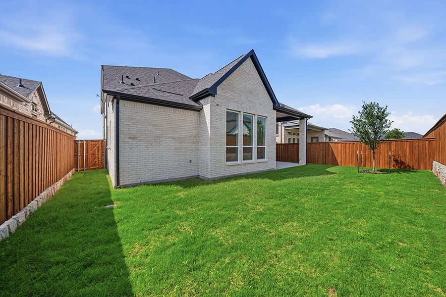 Exterior details and patio area of a home in Hillside Village, Celina (Image 4).