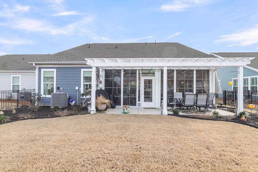 Exterior details and patio area of a home in , Summerville (Image 3).