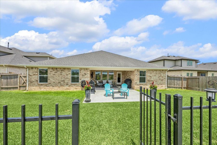 And here you can see the gate so you can walk the dogs, go jogging, walking, head to the resort-style community pool and clubhouse.