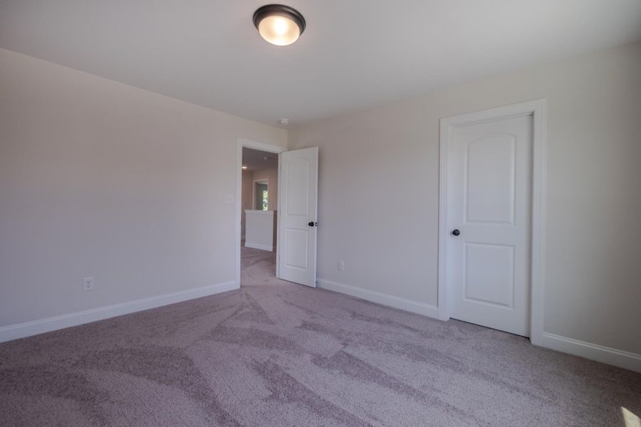 Spacious, unfurnished interior of a new home in Cottages at Piper Village, Trinity (Image 34). Spacious, unfurnished interior of a new home in Cottages at Piper Village, Trinity (Image 34).