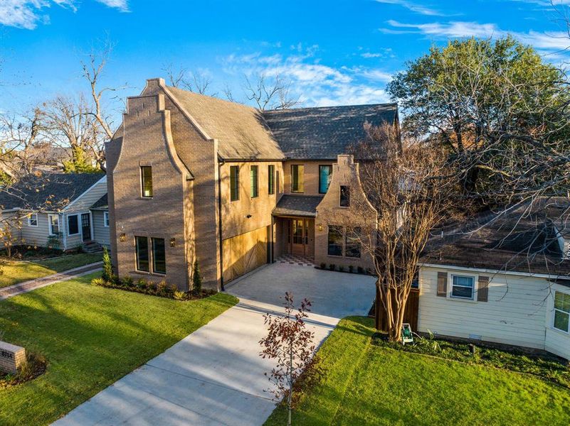 Front exterior of a new home in , Dallas, TX, highlighting curb appeal (Image 23).