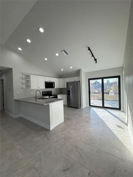 Spacious, unfurnished interior of a new home in , Port Charlotte (Image 13).