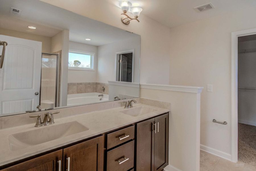 Representative furnished interior of a home built from the Drayton by Caviness & Cates Communities in Bartlett Manor, Youngsville (Image 213).