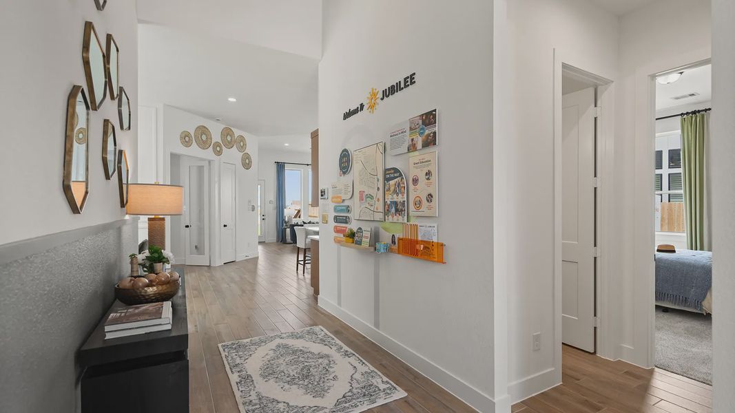 Representative furnished interior of a home built from the Hillcrest by Chesmar Homes in Artavia, Conroe (Image 5).