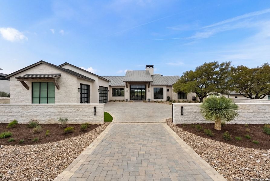 Front exterior of a new home in , Boerne, TX, highlighting curb appeal (Image 21).